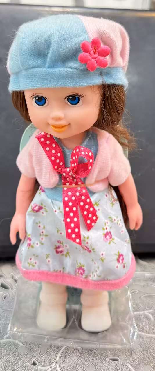 عروسک گوشتی با کلاه