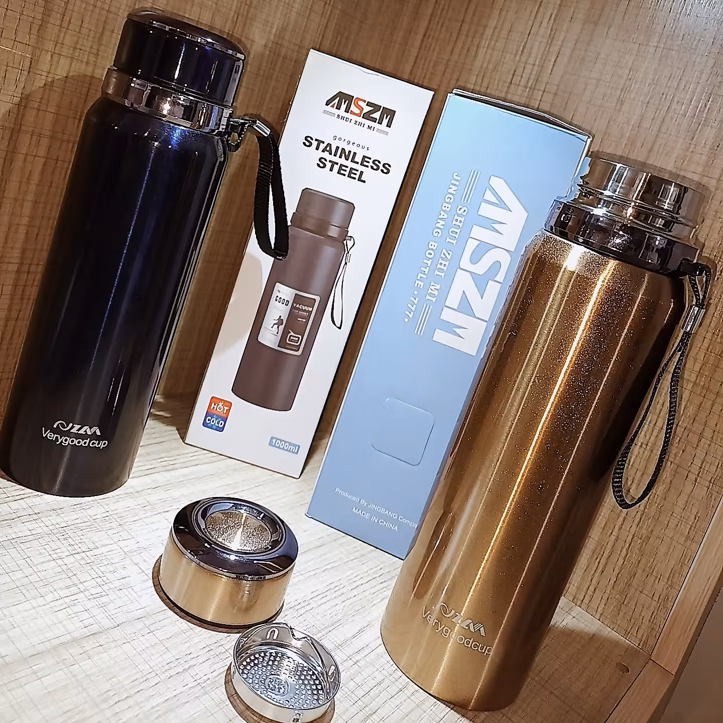 فلاسک 1لیتر کوهنوردی استیل رنگAMSZM سرمه ای و طلایی 