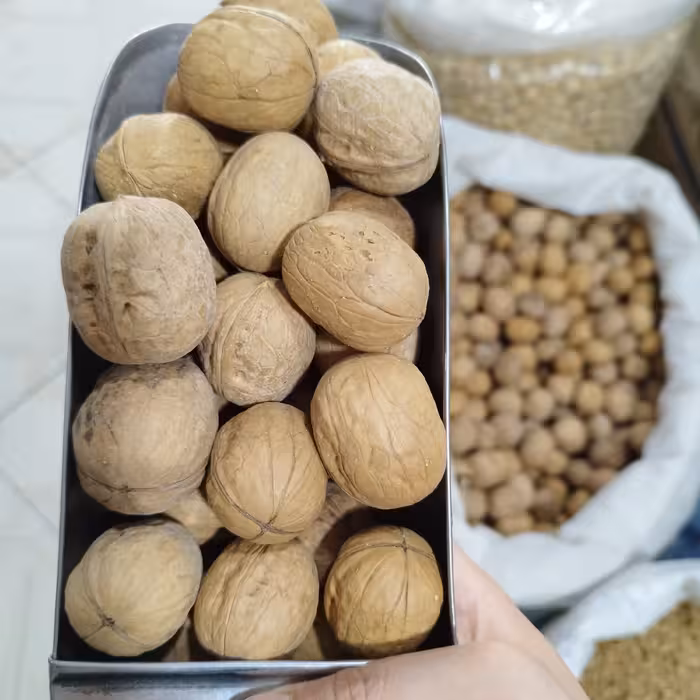 گردو پوست کاغذی درجه یک تازه (یک کیلو) خارجی پوست کاغذی . باپوست شسته تمیز