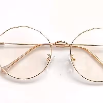 عینک طبی گرد چند ضلعی رنگ طلایی