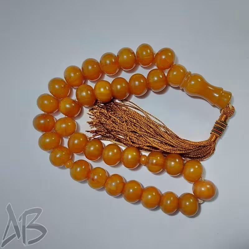 تسبیح کهربای 33 دانه بسیار خوش نقش و خوش دست کد 900 آقابزرگ