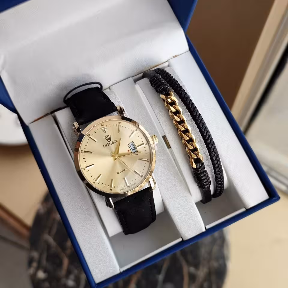 ست مردانه ساعت رولکس  بند چرم بدنه استیل دارای روز شمار و دستبند چرم دو لاین کد 42 جدید 