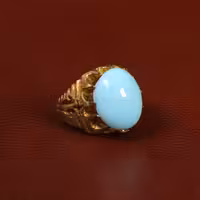 نگین فیروزه عجمی کد 29852 - جواهری مشاهیر