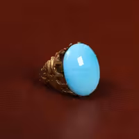 نگین فیروزه عجمی کد 29866 - جواهری مشاهیر