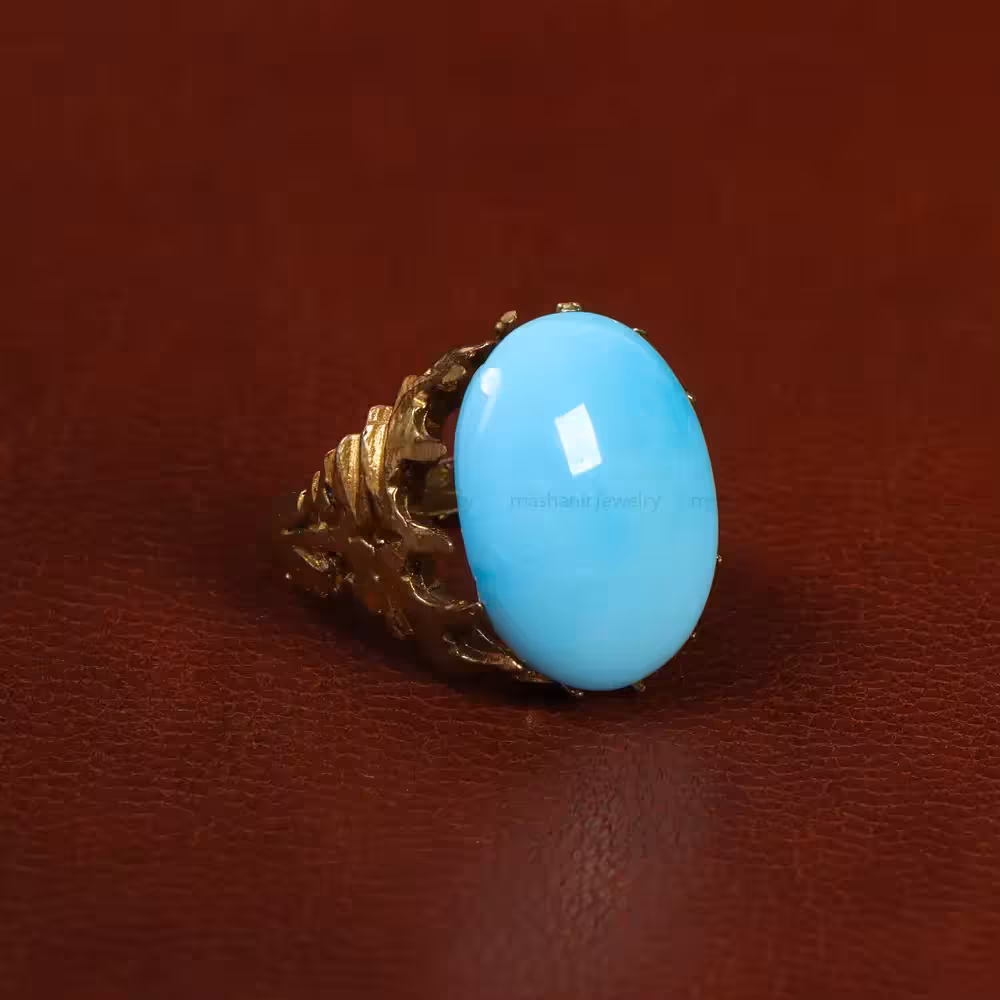 نگین فیروزه عجمی کد 29866 - جواهری مشاهیر