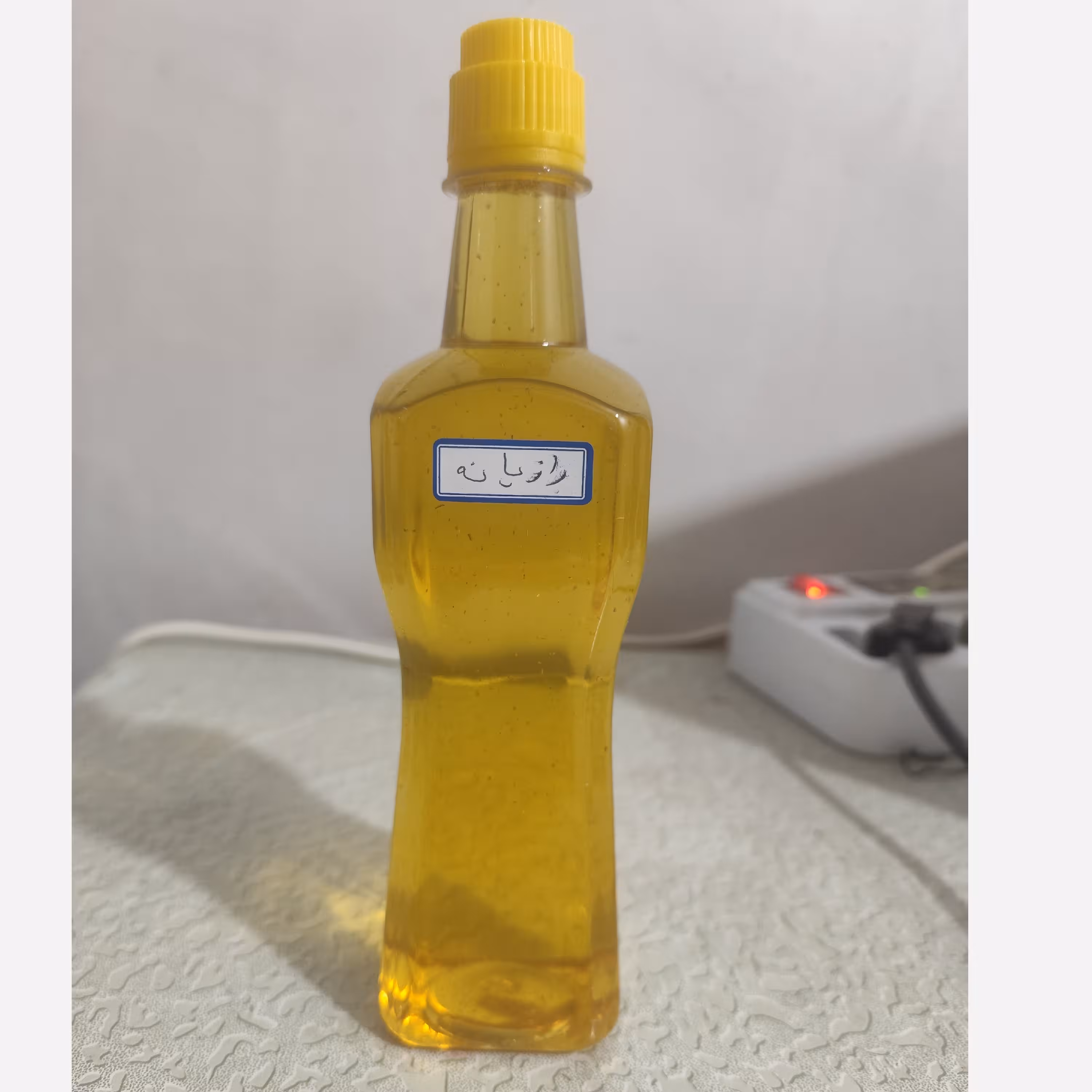 روغن رازیانه بنماری نیم لیتری اصل (رفع موهای زائد روشن کننده نرم کننده پوست موهای زاید موبر)