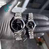 خرید ست ساعت زنانه و مردانه الگانس کلاسیک رنگ ثابت کیفیت عالی دارای رنگبندی کد 2117254 - ردگل