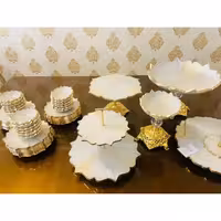 ظروف پذیرایی 12نفره رزینی شیک جهیزیه عروس طرح مرمر نباتی طلایی