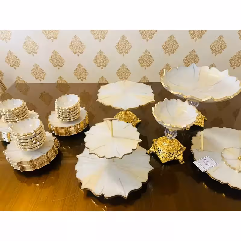 ظروف پذیرایی 12نفره رزینی شیک جهیزیه عروس طرح مرمر نباتی طلایی