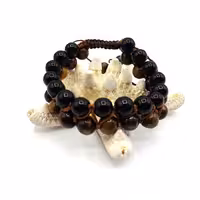 دستبند دو ردیفه چشم ببر اونیکس مشکی کد 310160