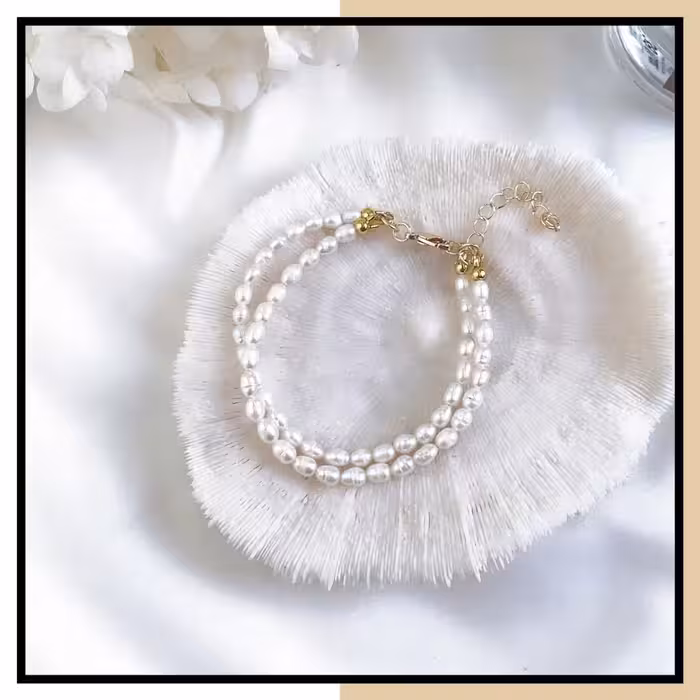 دستبند مروارید پرورشی ( مروارید طبیعی) دور ردیفه طرح گندمی با متریال استیل رنگ ثابت و ارسال رایگان