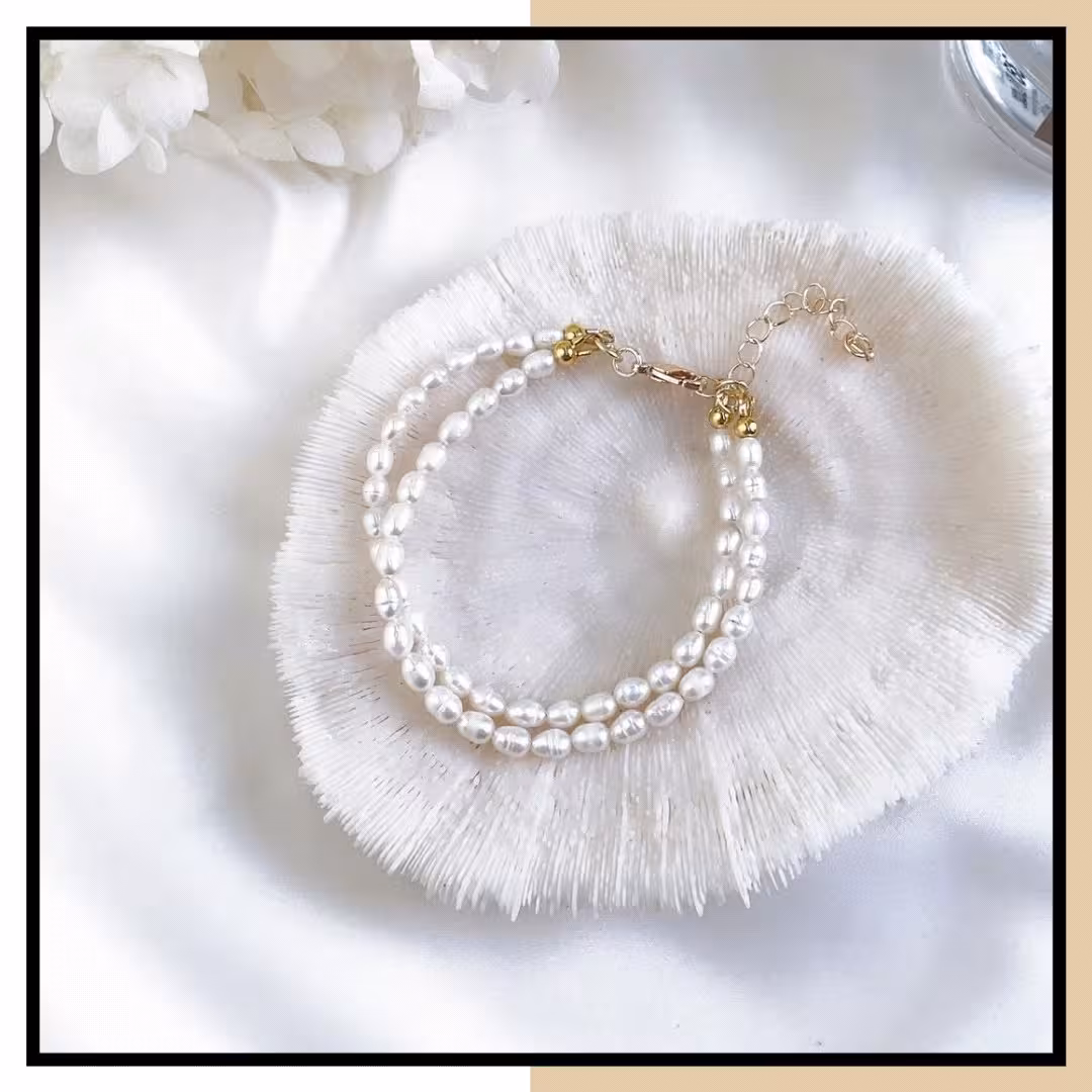 دستبند مروارید پرورشی ( مروارید طبیعی) دور ردیفه طرح گندمی با متریال استیل رنگ ثابت و ارسال رایگان