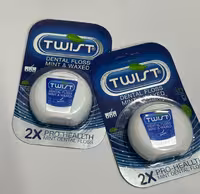 نخ دندان توییست