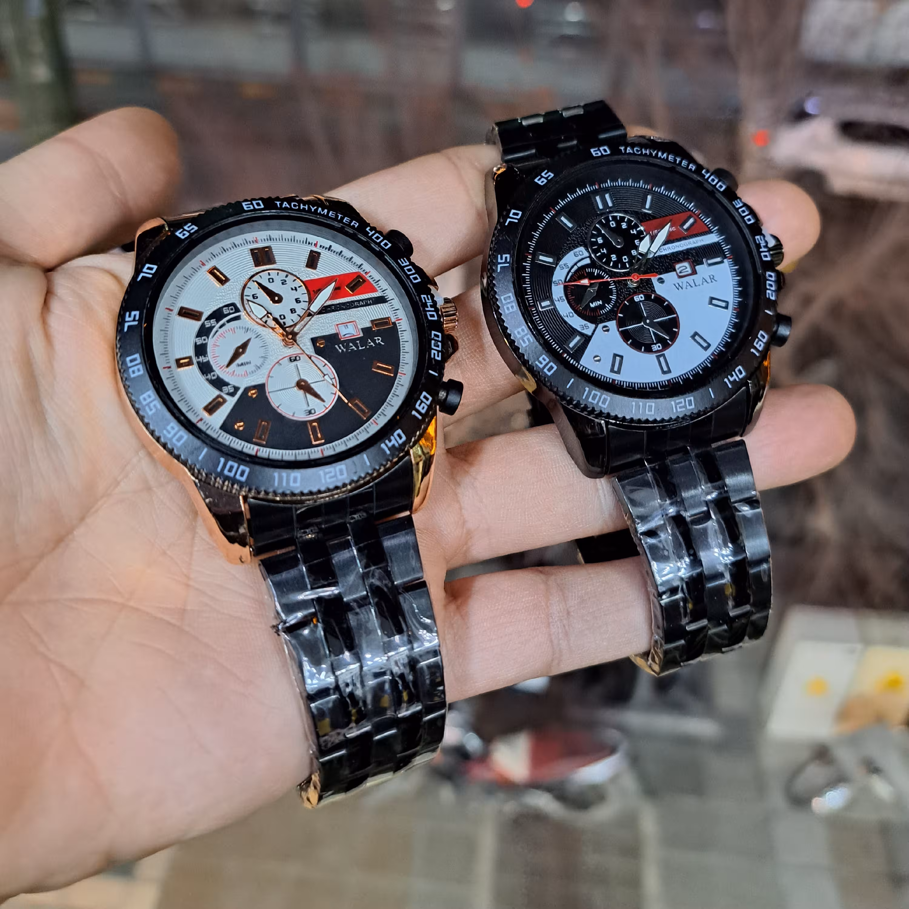 ساعت مردانه اسپرت بندفلزی تاریخ دار رنگ طلایی مشکی نقره ای والار