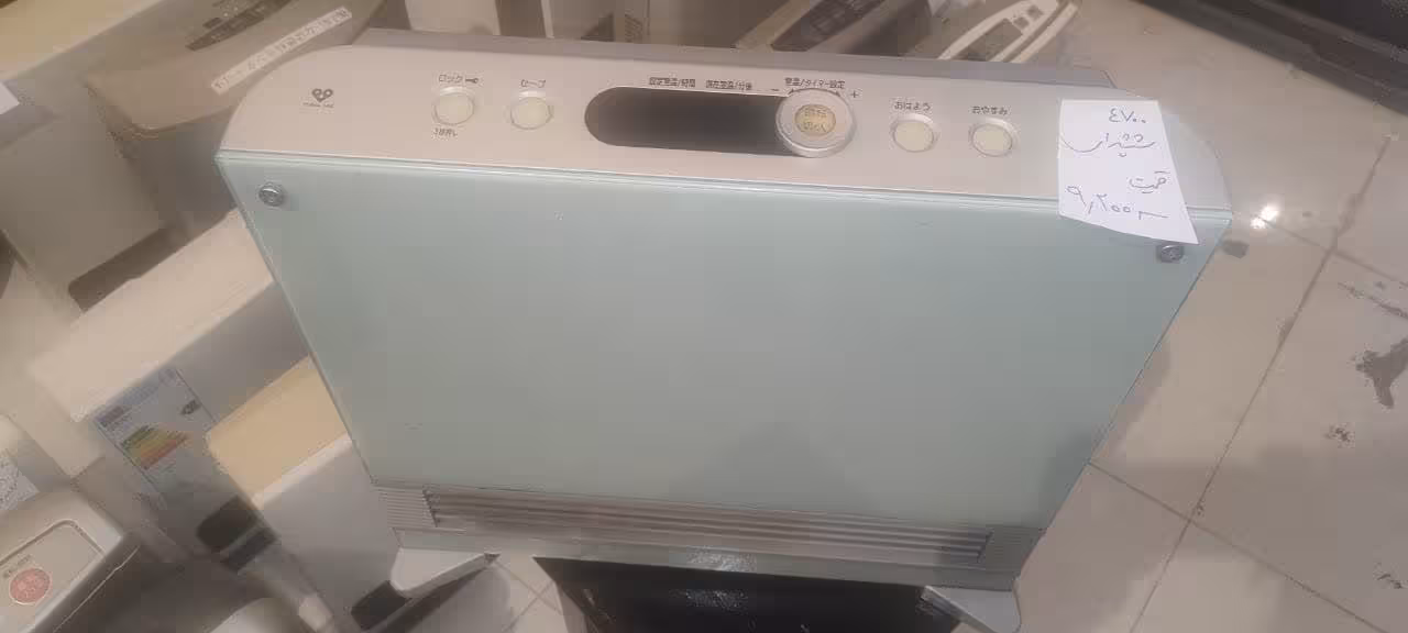 بخاری گازی برقی ژاپنی  4700 وات شیشه ای دست دوم