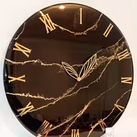 ساعت دیواری مشکی طلایی طرح سنگ  رزینی قطر60