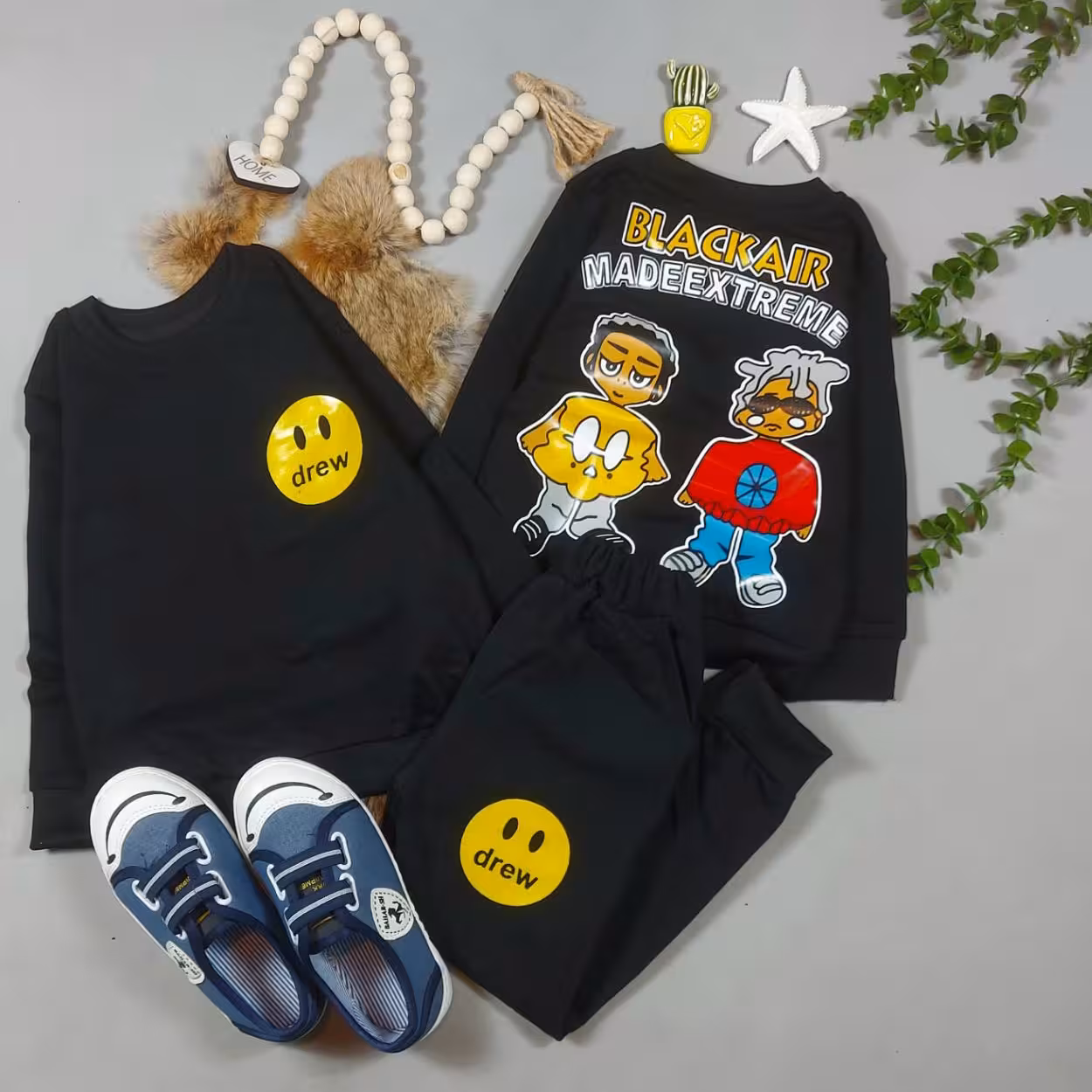 بلوز شلوار مشکی چاپ استیکر زرد پشت اسپورت دختر و پسر پنبه لاکرا  سایز  35