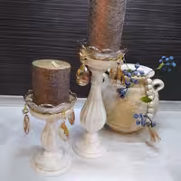 شمعدان پلی استر ست دو تایی پتینه شده ارتفاع سی و سه وبیست و هفت سانت بدون زنبق و اویز 