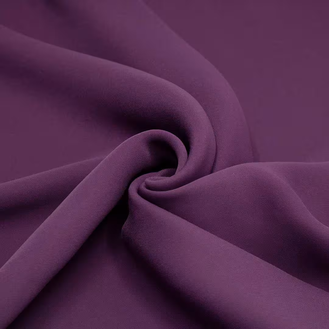 پارچه کرپ بادمجانی