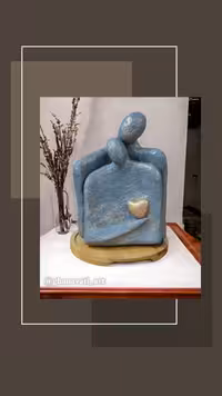مجسمه آغوش پاپیه ماشه