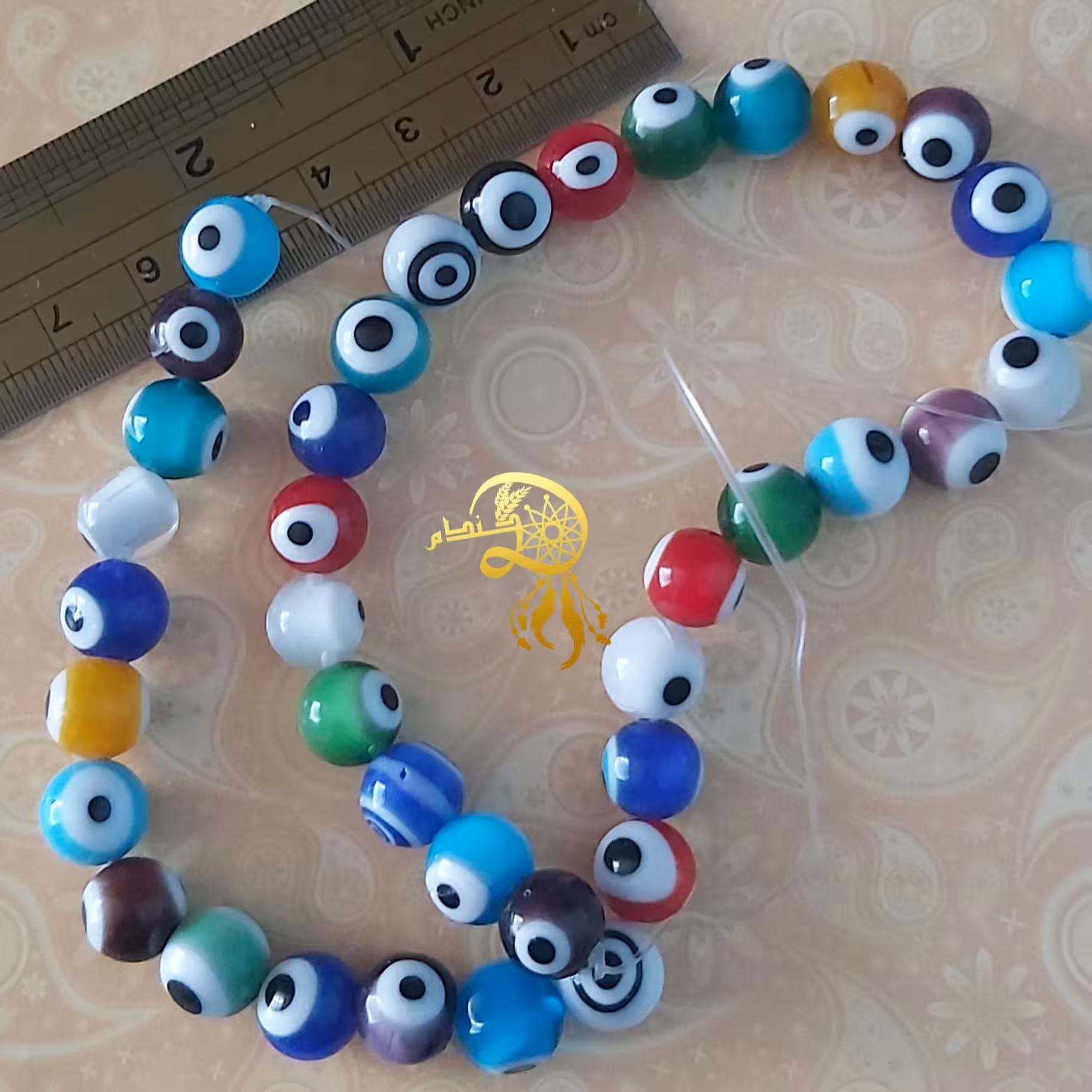 چشم نظرسنگی گرد یک ریسه