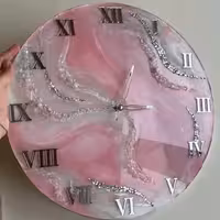 ساعت دیواری رزینی طرح اطلس قطر60