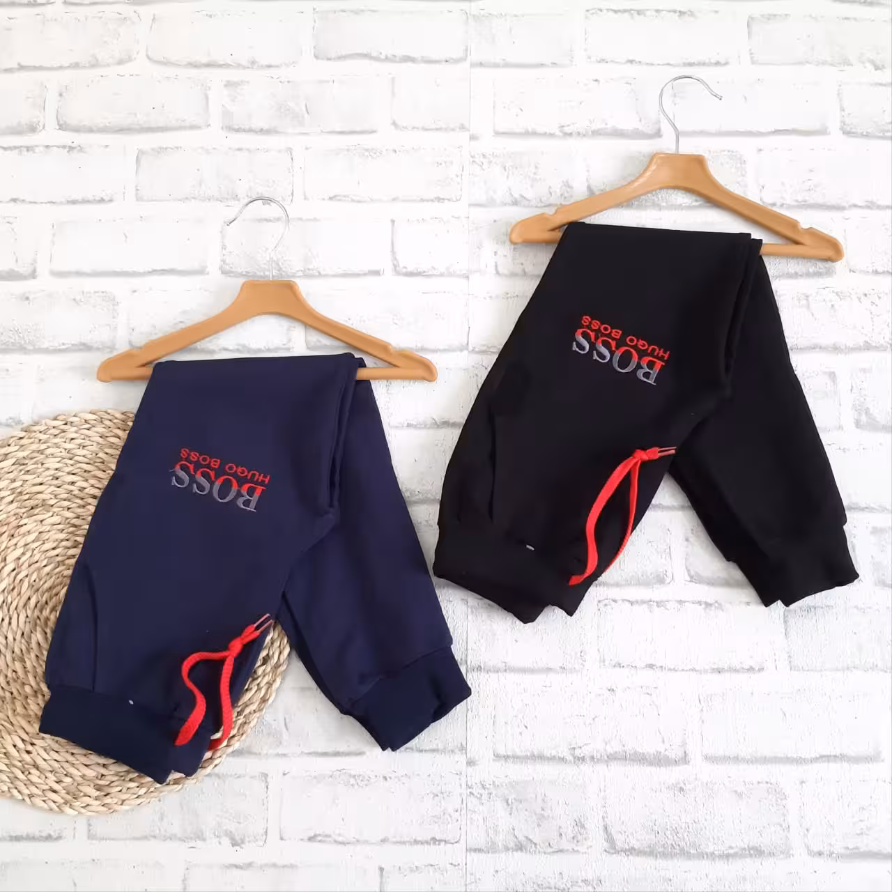 شلوار اسلش دخترانه و پسرانه رنگ سورمه ای و مشکی سایز 80 و 85 طرح BOSS کد688n