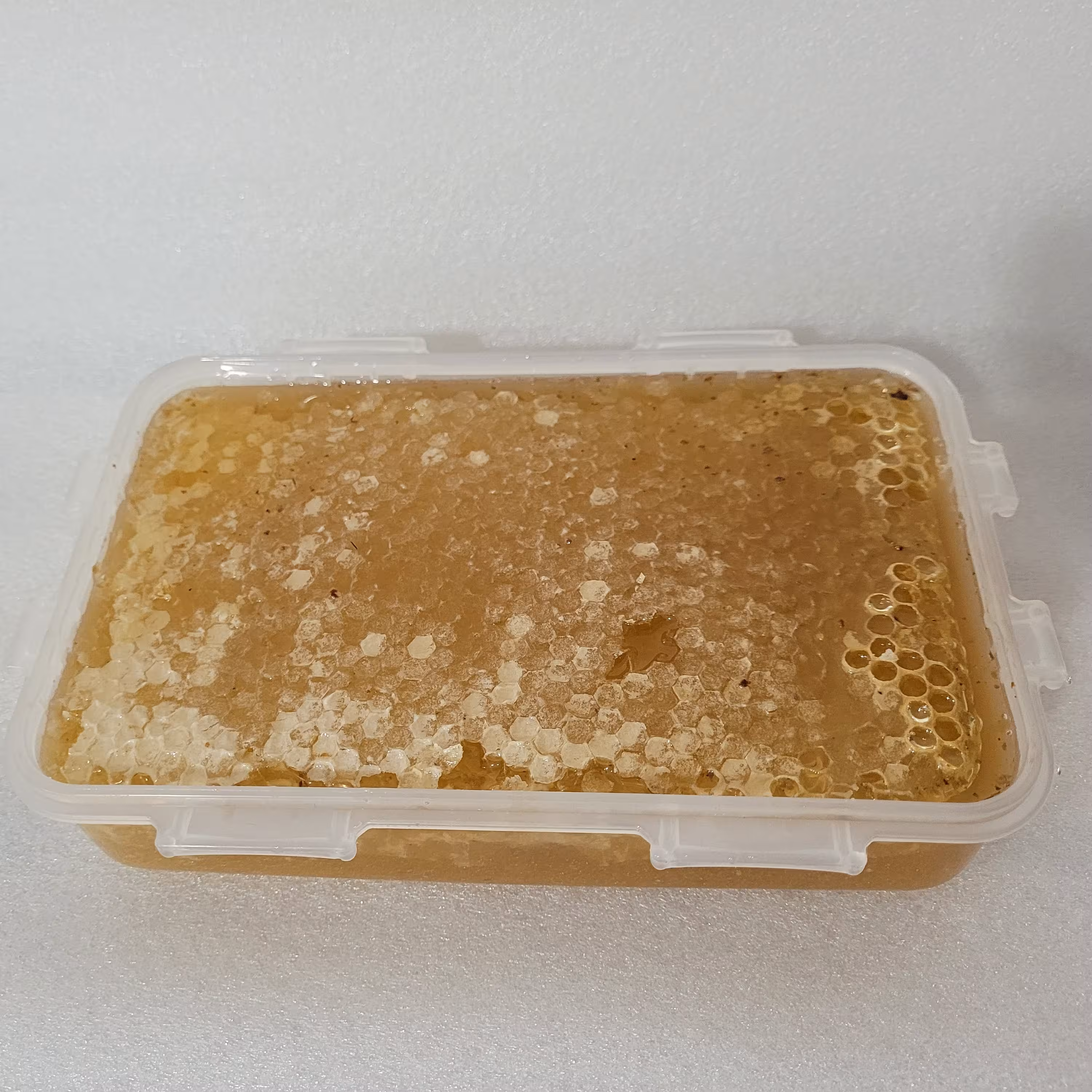 عسل اکالیپتوس مومدار 900 گرم عسل مومدار سالم و طبیعی