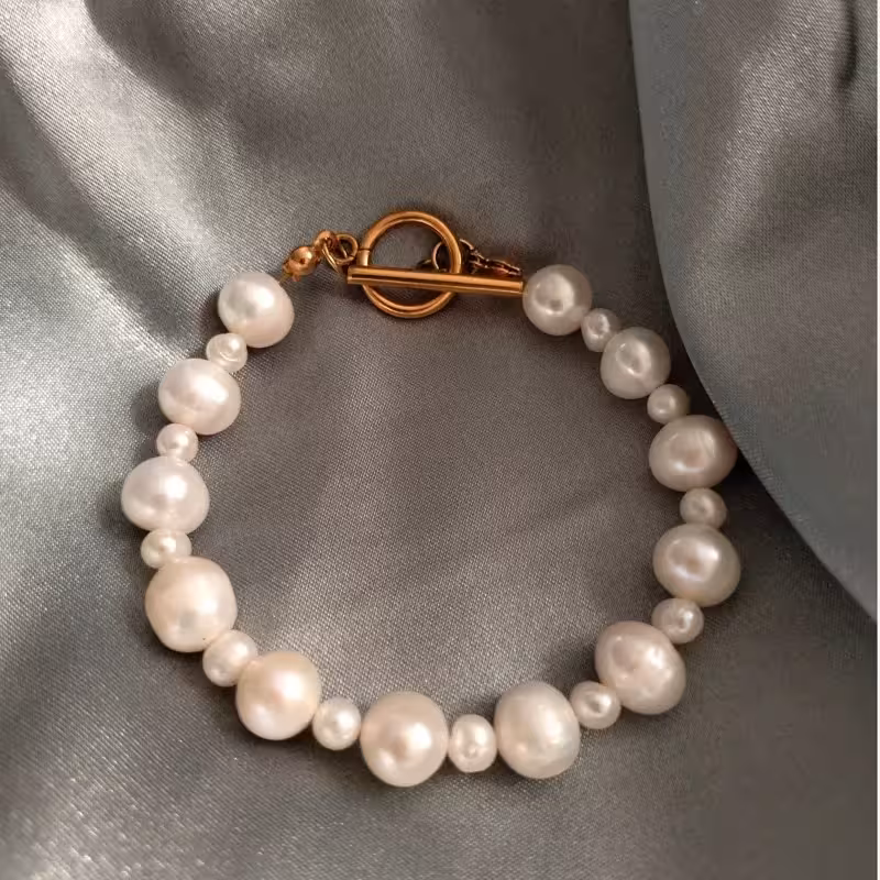 دستبند مروارید پرورشی سایز 8 و 4 درجه 1 کد mv1