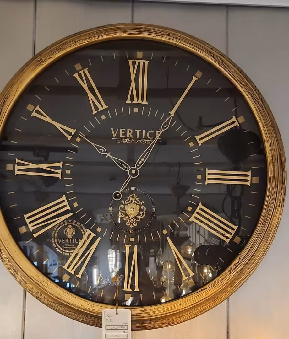 ارسال فوری   امکان خرید حضوری   ساعت دیواری چوبی ورتیچ قطر 60 سانت – رنگ مشکی طلایی – مدل 4060