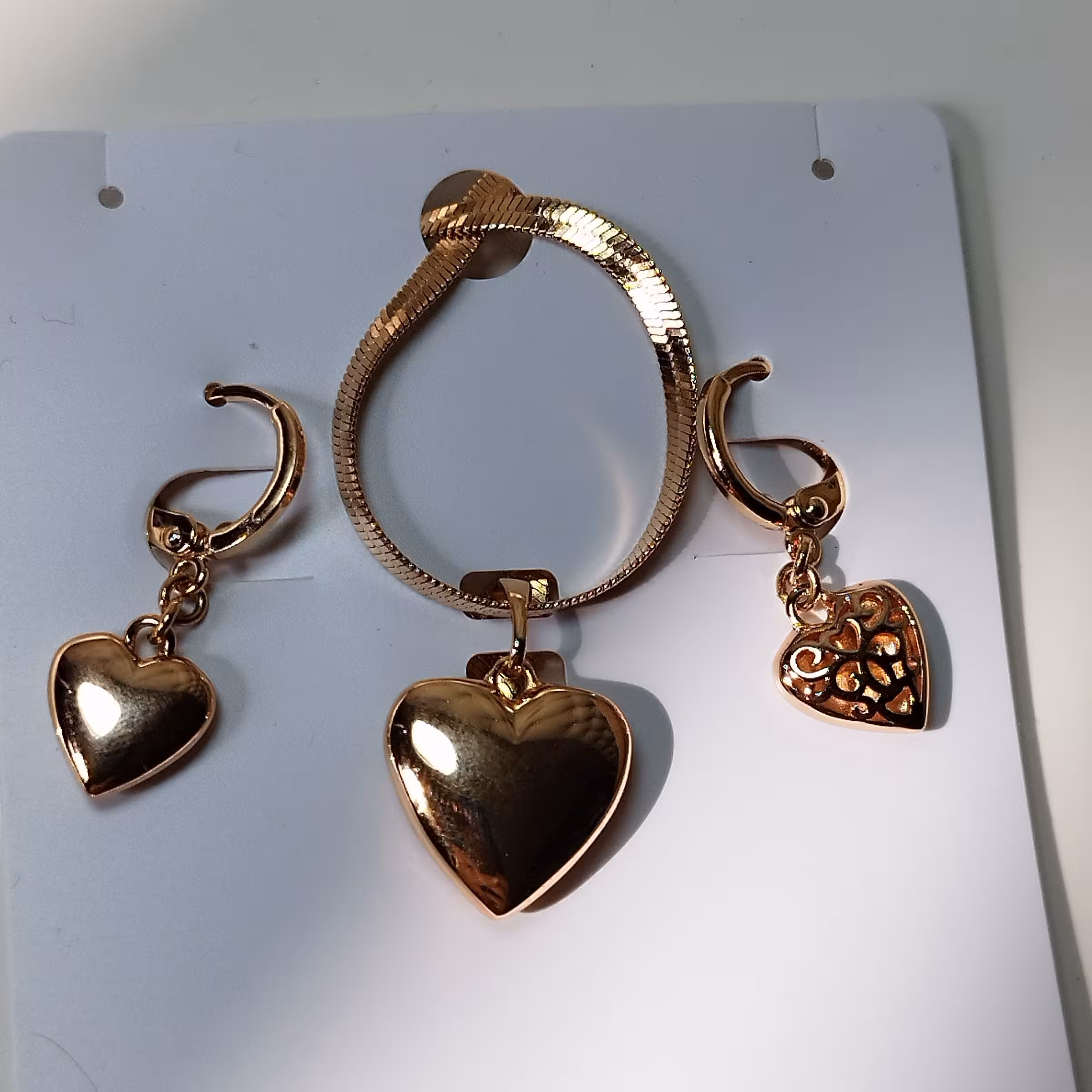 نیم ست برند شوپینگ طرح قلب دوطرفه رنگ ثابت و ضد حساسیت. قیمت زنجیر  جداگانه 130