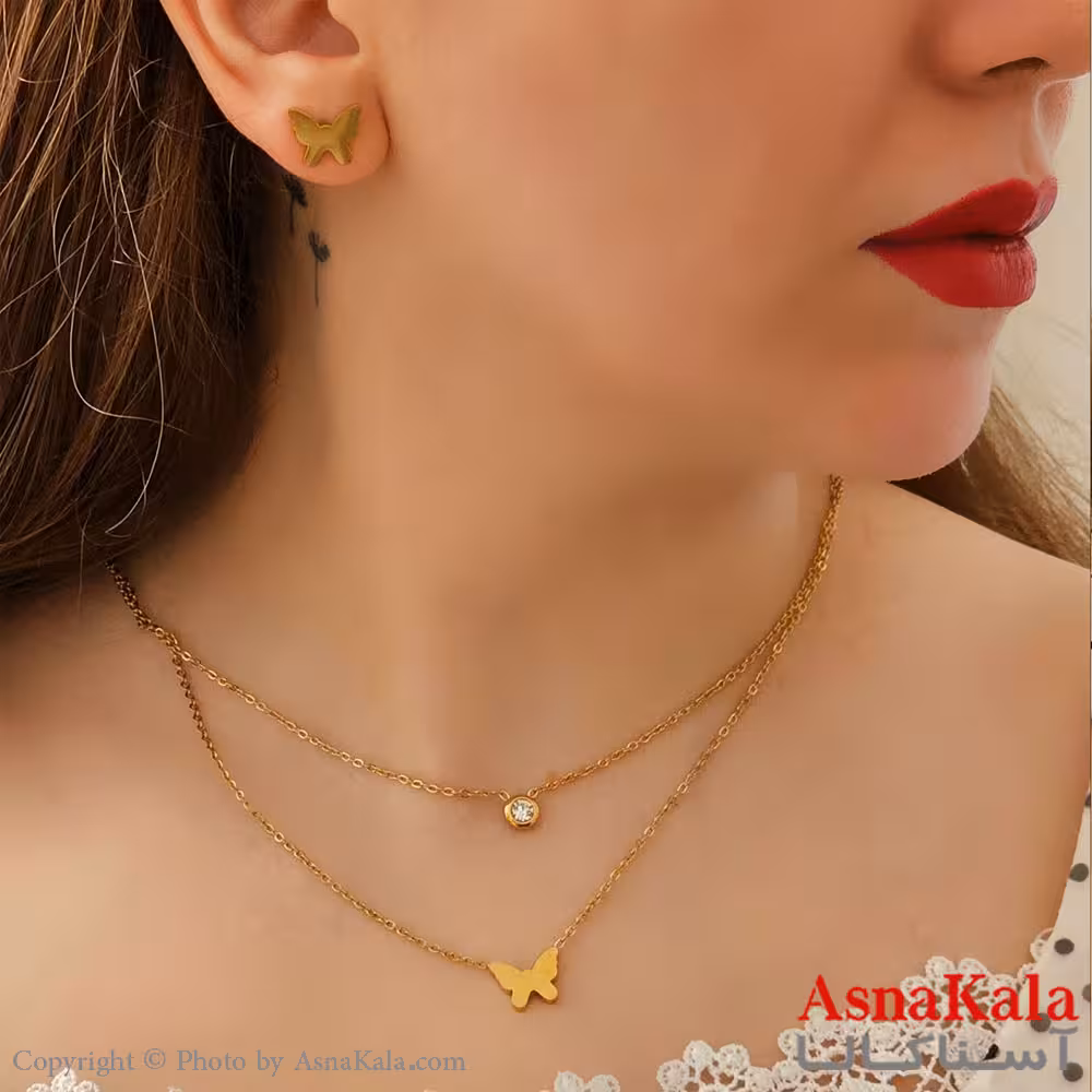 نیم ست زنانه شامل گردنبند و گوشواره  و دستبند مدل پروانه رنگ طلایی کد NIM14492W