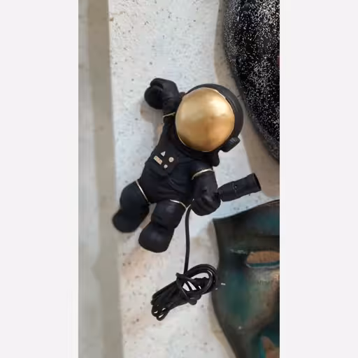 چراغ خواب دیوارکوب فضانورد