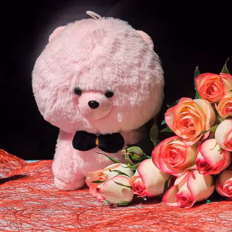 عروسک سگ پشمالو صورتی کله گنده در کرمان