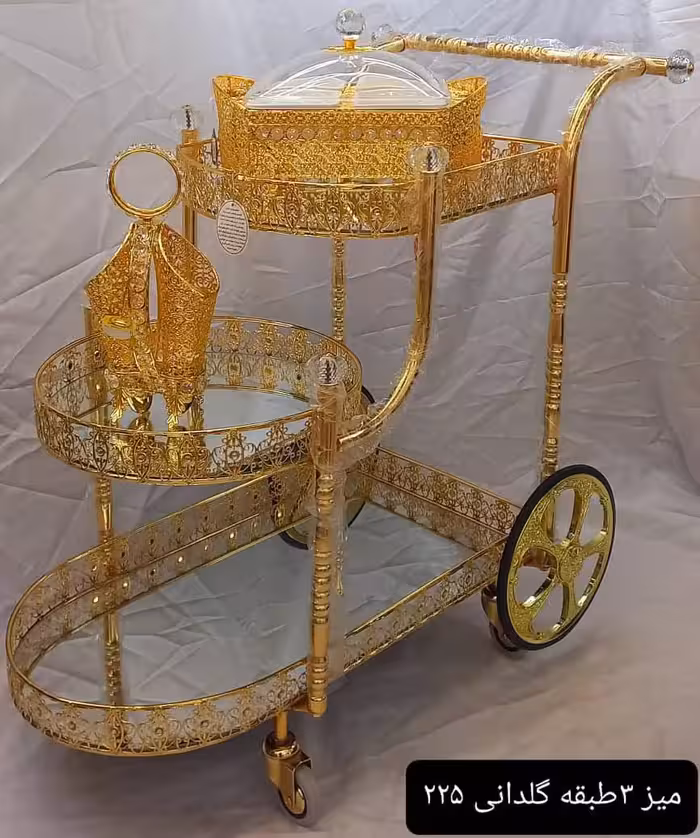 میز پذیرایی سه طبقه ال چرخ دار طرح گلدانی رنگ طلایی سایز بزرگ