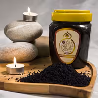 دو سین  عسل کنار بوشهر   و سیاه دانه مهرگان ایران   (500 گرم )