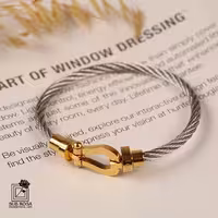 دستبند امگا طلایی-نقره ای 13445