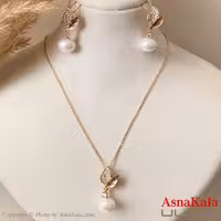 نیم ست زنانه ژوپینگ مدل برگ و مروارید نگیندار شامل گوشواره و آویز رنگ طلایی کد NIM14969W