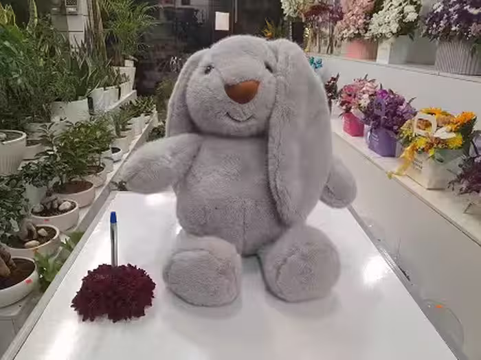 عروسک خرگوش خندان خاکستری