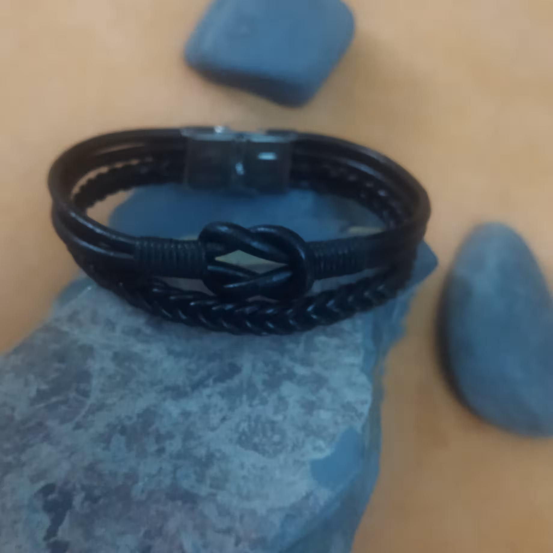 دستبند چرم مصنوعی طرح بافت و گره 