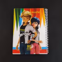 دفتر 80 برگ - طلقی سیمی - خط دار شفیعی - کد 37 - طرح دختر کفشدوزکی