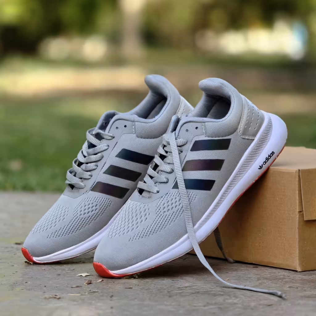 تخفیف عالی کفش کتونی اسپرت مردانه و پسرانه بزرگپا مدل  آدیداس اسپیسر  خاص و شیک رنگ طوسی هولوگرامی باارسال رایگان