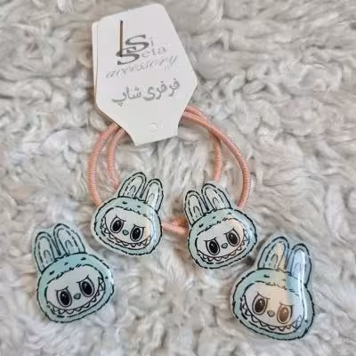 ست کش مو و گیره مو عروسکی دخترانه مدل لبوبو رنگ سبزآبی