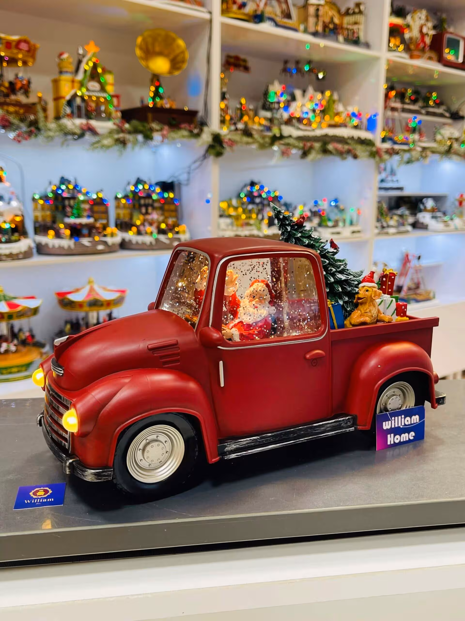 ماشین موزیکال بابانوئل کریسمس،درخت کریسمس و کادو