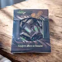 شکلات کوبار co barre the chocolat با روکش کاکائو و کرم شیری حاوی غلات