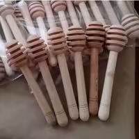 یک عدد قاشق چوبی عسل با دسته 12 سانتی موسسه پژوهشی طبی بازرگانی سیمرغ