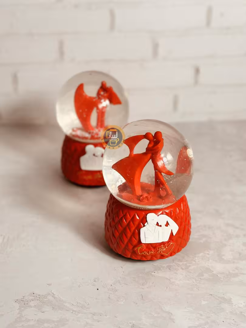 گوی موزیکال کوکی چرخان بزرگ طرح عروس و داماد قرمز کد 7594