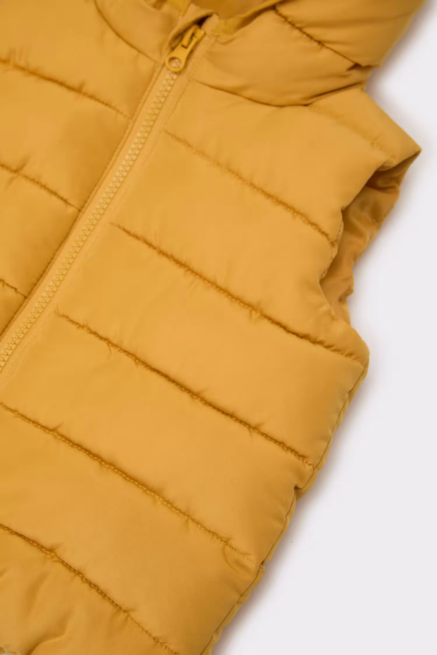 جلیقه نوزاد پسر زرد دفکتو