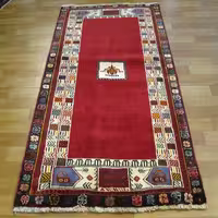 فرش دستباف شیراز طرح لچک و ترنج سایز قاليچه رنگ زمینه كرم رنگ حاشیه سرمه اي کد 39528