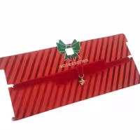 چوکر یا دور گردنی مخمل قرمز کریسمسی آویز زنگوله طلایی برند ACC کد 12091